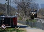 With the Langley Fountain spraying high to the right and a local catching some rays to the left, NS yard job E19 starts its return to home base, NS Montview Yard, with a few cars received from CSX.,